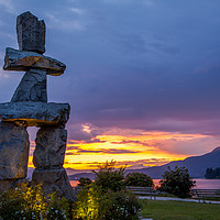 Buy canvas prints of Inukshuk at sunset from English Bay Vancouver  by David Belcher