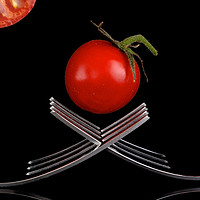 Buy canvas prints of Tomato with forks by Judith Flacke