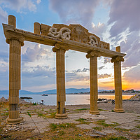 Buy canvas prints of Haraki Beach Rhodes Greece Sunset by Ian Woolcock