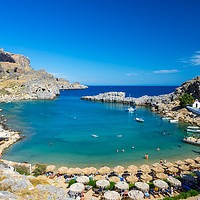 Buy canvas prints of St Pauls Bay Lindos Rhodes Greece by Ian Woolcock