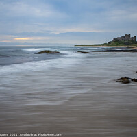 Buy canvas prints of Bamburgh castle beach waves northumberland by david siggens