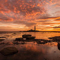 Buy canvas prints of Fire in the sky St marys Lighthouse by david siggens