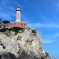 Buy canvas prints of Lighthouse on the island of Capri, Italy by Carmen Green