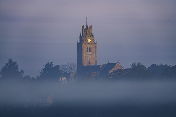 St Andrew's Church, Sutton-in-the-Isle, emerges from the morning Picture Board by Andrew Sharpe