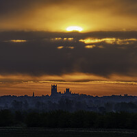 Buy canvas prints of Sunrise behind Ely Cathedral, 6th May 2021 by Andrew Sharpe