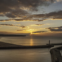 Buy canvas prints of Sunset over Whitby piers by Andrew Sharpe