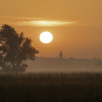 Buy canvas prints of Sunrise over Sutton, Cambridgeshire, from the 100 Foot Bank by Andrew Sharpe