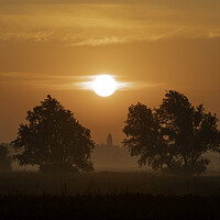 Buy canvas prints of Sunrise over Sutton, Cambridgeshire, from the 100 Foot Bank by Andrew Sharpe