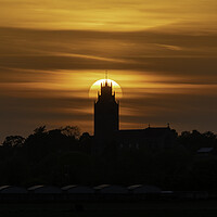 Buy canvas prints of Sunset behind St Andrew's Church, Sutton-in-the-Isle, Cambs by Andrew Sharpe
