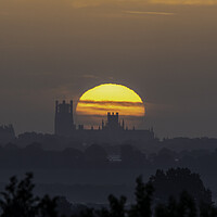 Buy canvas prints of Sunrise behind Ely Cathedral, 14th May 2022 by Andrew Sharpe