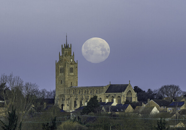 "Snow Moon" setting over St Andrew's, Sutton Picture Board by Andrew Sharpe