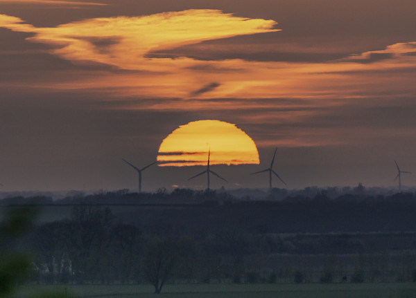 Sunset behind Tick Fen windfarm 11th April 2019 Picture Board by Andrew Sharpe