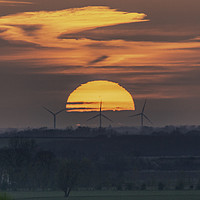 Buy canvas prints of Sunset behind Tick Fen windfarm 11th April 2019 by Andrew Sharpe