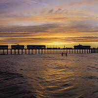 Buy canvas prints of Dawn over Southwold Pier, 10th June 2017 by Andrew Sharpe