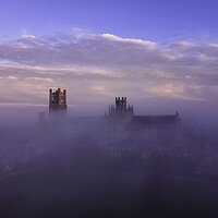 Buy canvas prints of Dawn over a misty Ely Cathedral, 5th November 2020 by Andrew Sharpe
