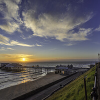 Buy canvas prints of Dawn over Cromer Pier, Norfolk by Andrew Sharpe