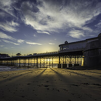 Buy canvas prints of Dawn over Cromer Pier, Norfolk by Andrew Sharpe
