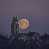 Buy canvas prints of Snow Moon (or Hunger Moon) setting behind St Andre by Andrew Sharpe