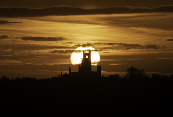 Sunrise behind Ely Cathedral, Cambridgeshire  Picture Board by Andrew Sharpe
