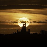 Buy canvas prints of Sunrise behind Ely Cathedral, 24th February 2021 by Andrew Sharpe
