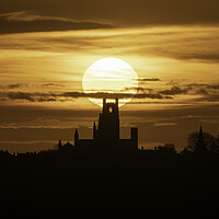 Buy canvas prints of Sunrise behind Ely Cathedral, 24th February 2021 by Andrew Sharpe