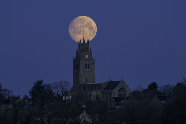 Moonset behind St Andrew's Church, Sutton-in-the-Isle, Cambridge Picture Board by Andrew Sharpe