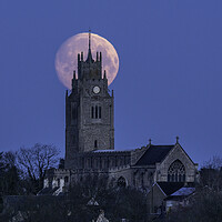 Buy canvas prints of Moonset behind St Andrew's Church, Sutton-in-the-Isle, Cambridge by Andrew Sharpe