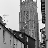 Buy canvas prints of Cromer church and narrow street by PAUL OLBISON