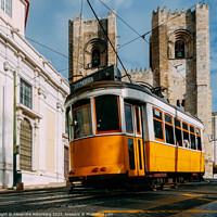 Buy canvas prints of Se Lisbon Cathedral with a traditional yellow tram by Alexandre Rotenberg