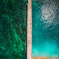 Buy canvas prints of Top down aerial view of amazing colours at a beach and pier by Alexandre Rotenberg