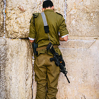 Buy canvas prints of Israeli soldier on Western Wall, Israel by Alexandre Rotenberg