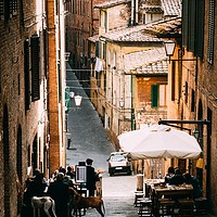 Buy canvas prints of Aperitivo time in Siena, Tuscany, Italy by Alexandre Rotenberg