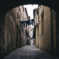 Buy canvas prints of Dark alleyway in Siena, Tuscany, Italy by Alexandre Rotenberg