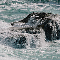 Buy canvas prints of Impressive swell of wave washing onto rocks on sto by Alexandre Rotenberg