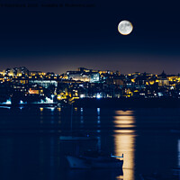 Buy canvas prints of Night view of Cascais, Portugal with full moon reflecting on water and fishing boats by Alexandre Rotenberg