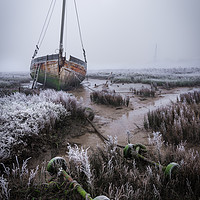 Buy canvas prints of Beached Boat in the Fog by Daniel Farrington