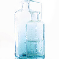 Buy canvas prints of Blue Medicine Bottles by Kelly Bailey