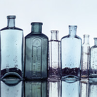 Buy canvas prints of Line of Bottles by Kelly Bailey