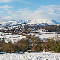 Buy canvas prints of Snow Covered Pendle Hill  by Tony Keogh