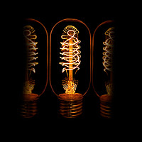 Buy canvas prints of Edison bulb alight by Donnie Canning