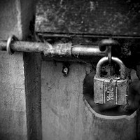 Buy canvas prints of Gate with rusty lock and bolt by Donnie Canning