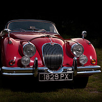 Buy canvas prints of Classic Jaguar XK150 Roadster in Red by Donnie Canning