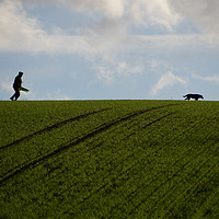 Buy canvas prints of One man and his dog by Donnie Canning