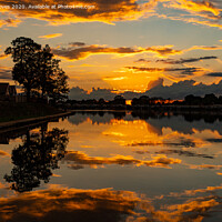 Buy canvas prints of Sunset Reflection by John Stoves