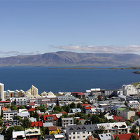 Buy canvas prints of Faxaflói Bay and cityscape, Reykjavík, Iceland by Linda More