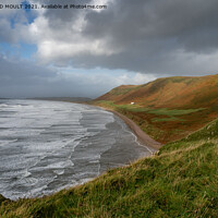 Buy canvas prints of Stormy Rhossili Beach on Gower by RICHARD MOULT