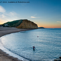 Buy canvas prints of Dawn Swim at West Bay in Dorset by RICHARD MOULT