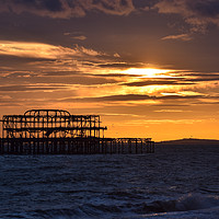 Buy canvas prints of West Pier at sunset by Roger Utting