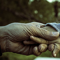Buy canvas prints of Grandfather and grandson holding hands by Juan Ramón Ramos Rivero