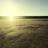 Buy canvas prints of Sunset sun illuminating the sand of the beach by Juan Ramón Ramos Rivero